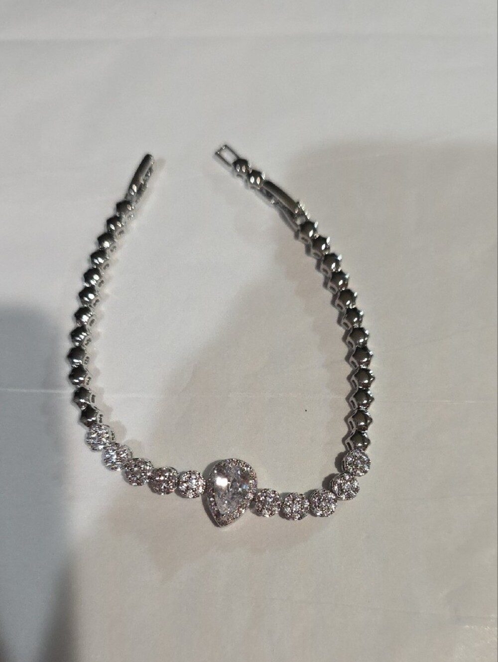 Pretty Bird Silver Pear-Cut Halo Tennis Bracelet